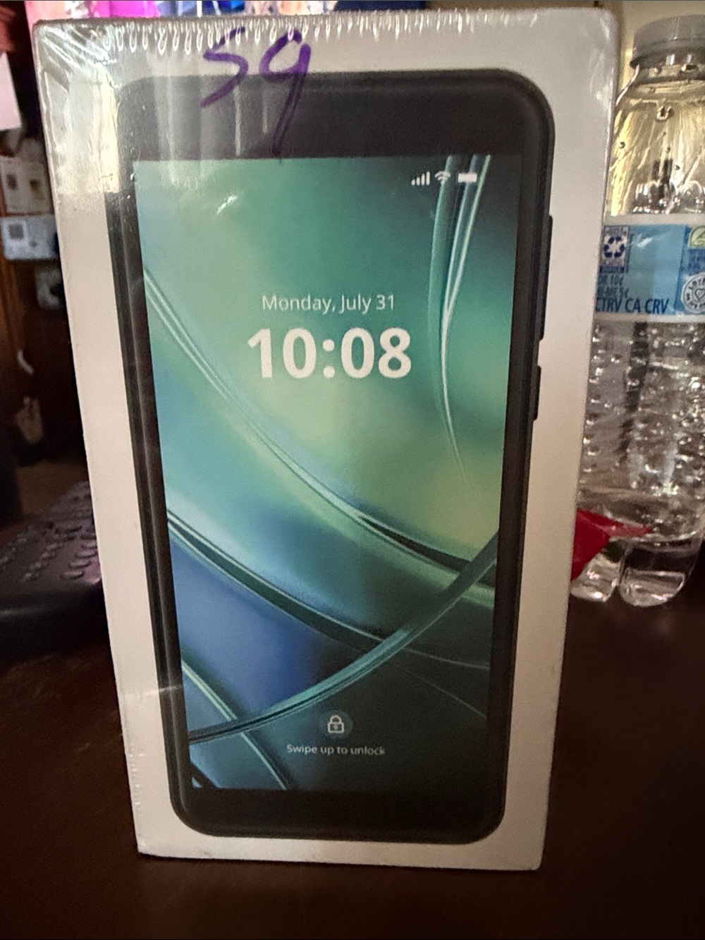 Fox Black Smartphone with Green-Blue Display Graphic